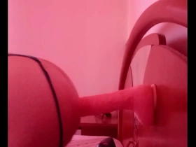 Anal sex with a dildo in gay porn.