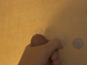 A solo performance of a Japanese boy masturbating with cumshots.