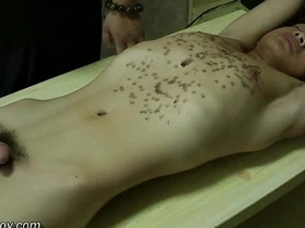 Young Asian man with a great body gets hot wax treatment.