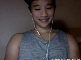 Young Asian boy masturbates on camera