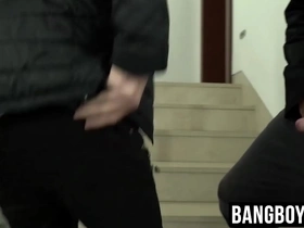Young gay men have hardcore sex in a public building