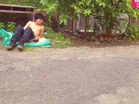 Public nudity practice for an adult magazine photo shoot in downtown garden by Hansel Thio.
