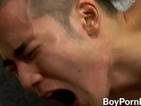 Young Japanese hunk Yoshi Kawasaki enjoys hardcore sex and a facial finish.