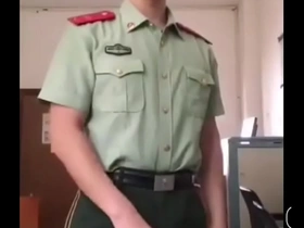 Gay Asian BDSM scene with a police officer and a suspect.