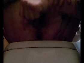 Gay man pleasure himself by licking his cock.