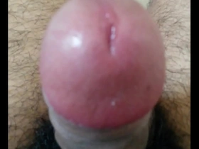 Asian man performs a sexy dance with his penis.