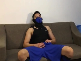 Gay scene with a Chinese handsome boy wearing a mask.