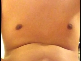 An Asian student masturbates.