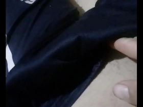 A hot video of a man with a hard cock wearing gloves, masturbating and having anal sex with others.