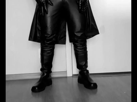 A young gay man dressed in leather gets it on with a much older partner.
