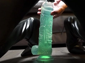 A solo players pleasure with a 12-inch dildo