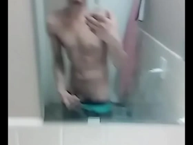 Steamy solo session of a hot gay man with a big cock in the bathroom
