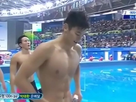 Asian hunk shows off his swimmer body and abs.