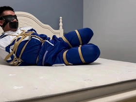 Asian boy in bondage: hogtie and blindfold